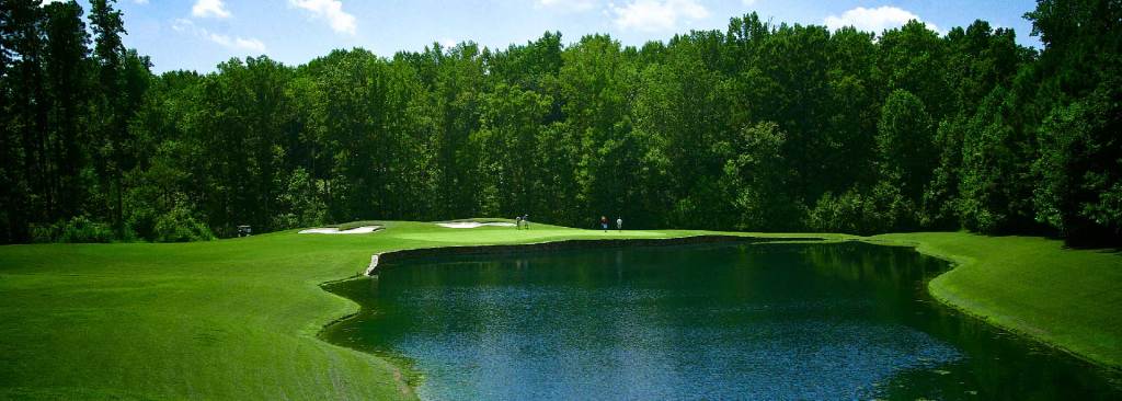 green beside a pond at Belmont Lake Golf Club in Rocky Mount, North Carolina